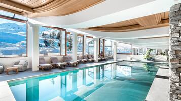 Indoor pool, seasonal outdoor pool, pool loungers, lifeguards on site