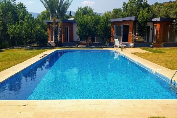 Seasonal outdoor pool, sun loungers