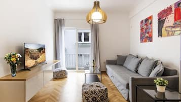Apartamento | Sala de estar | TV de tela plana
