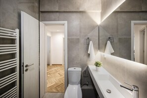 Apartment | Bathroom | Hair dryer, slippers, towels, soap