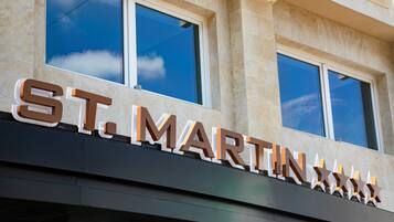 A building with the sign "ST. MARTIN'S" prominently displayed above the entrance.