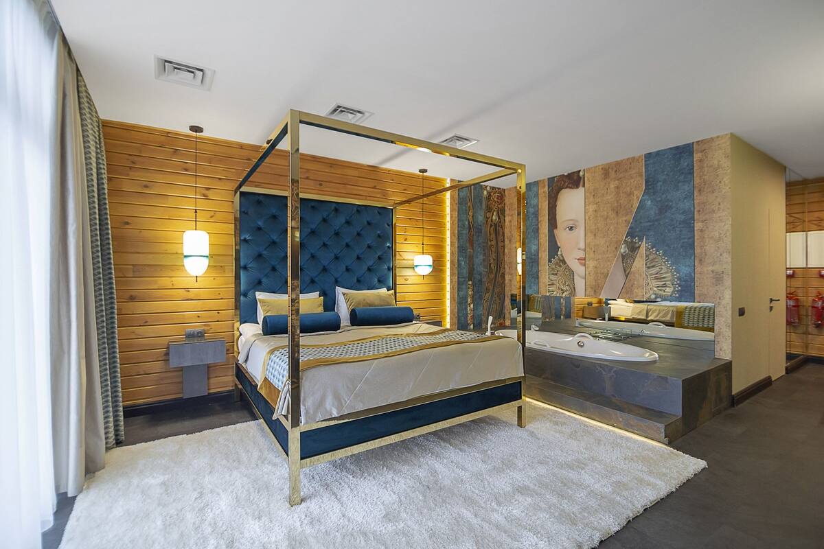 Luxury Cabin (Suite) | Minibar, desk, iron/ironing board (on request), WiFi (free)