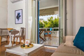 Apartment, 1 Bedroom | Living room | 32-inch Smart TV with digital channels, TV - Breeze One Bedroom Apartment by BluPine (Vari-Voula-Vouliagmeni)