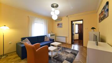 Apartment, 1 Bedroom | Living area | Flat-screen TV, Netflix, streaming services
