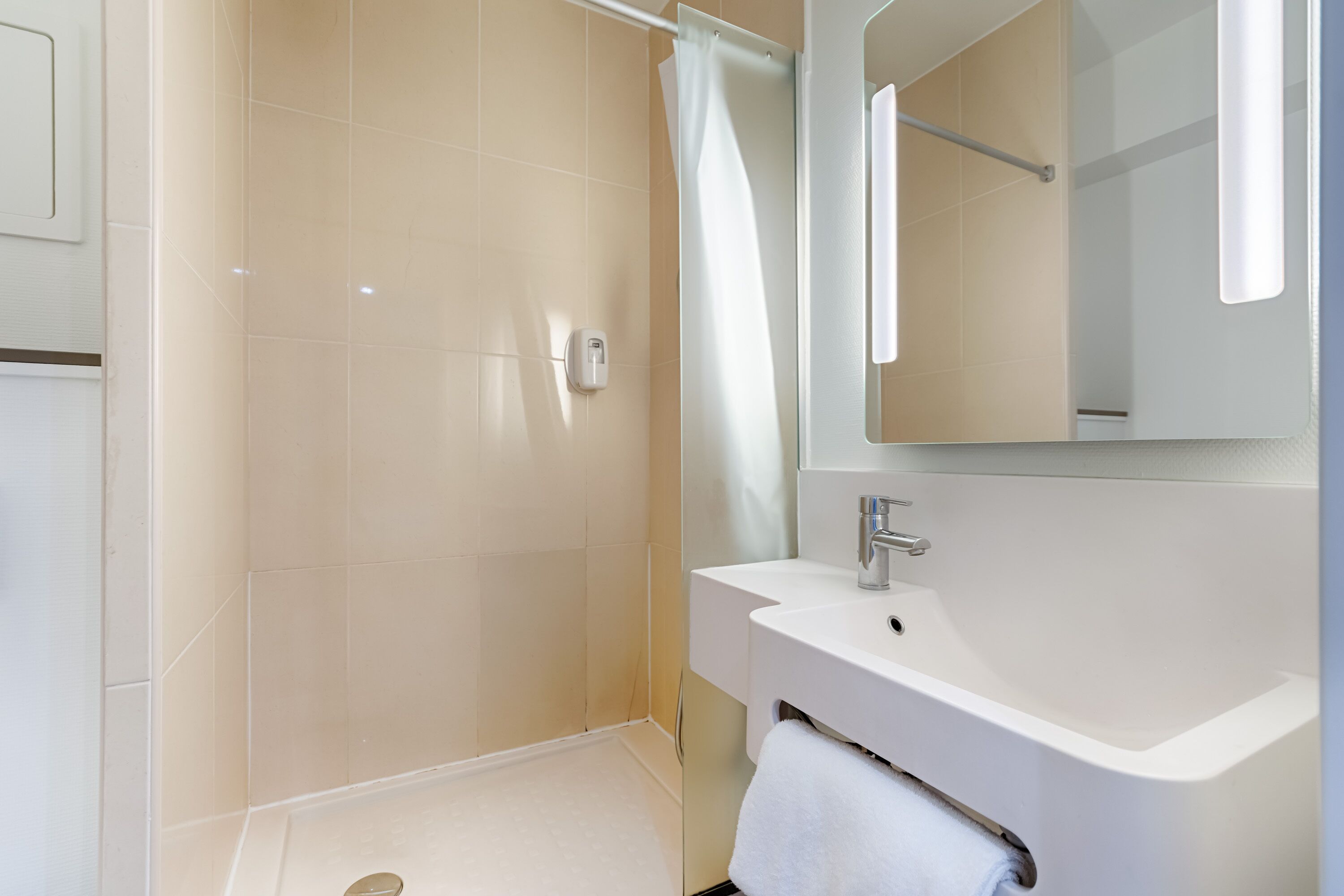 shower, towels, soap, toilet paper