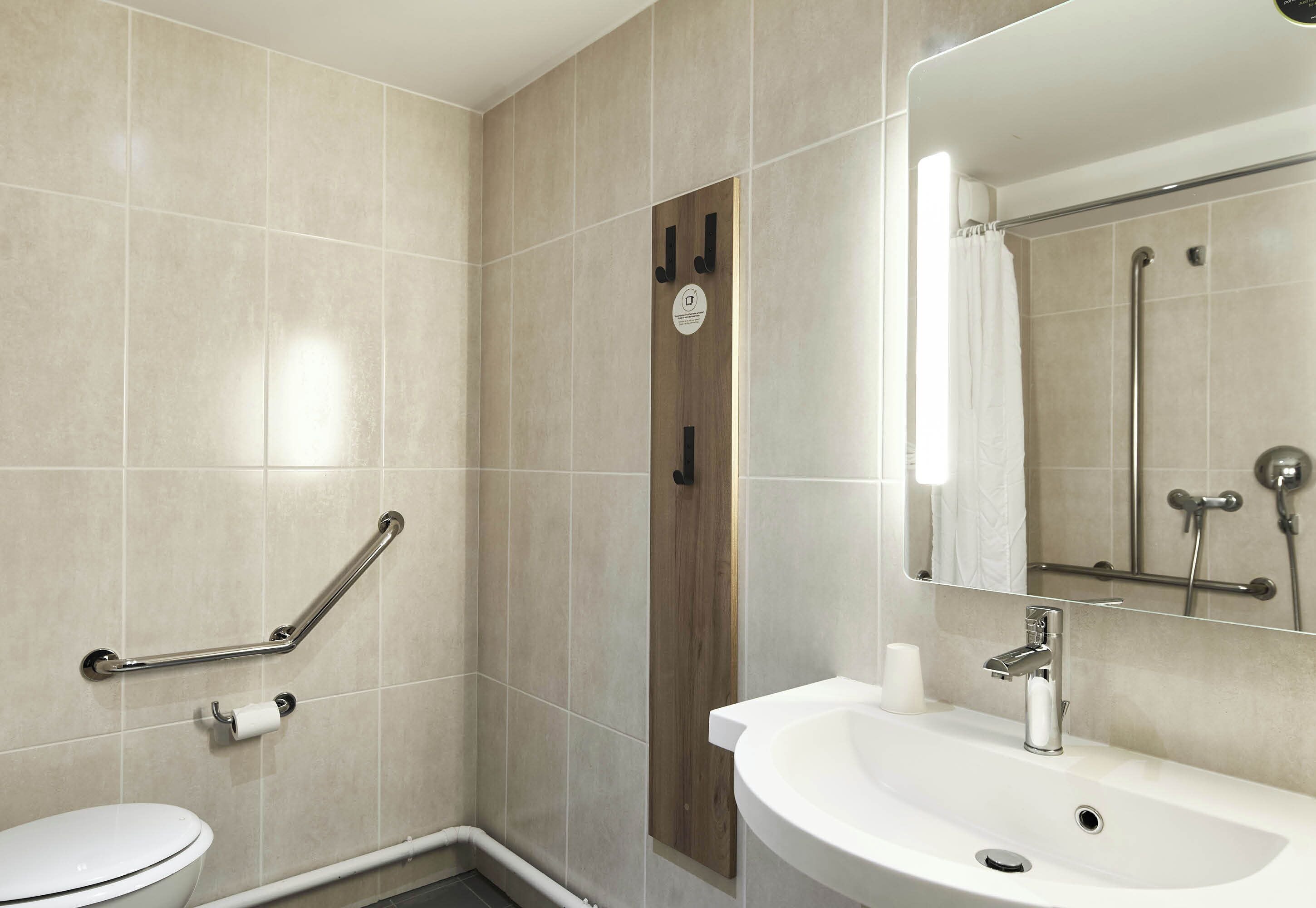 double room, mobility accessible | bathroom | shower, towels, soap, toilet paper