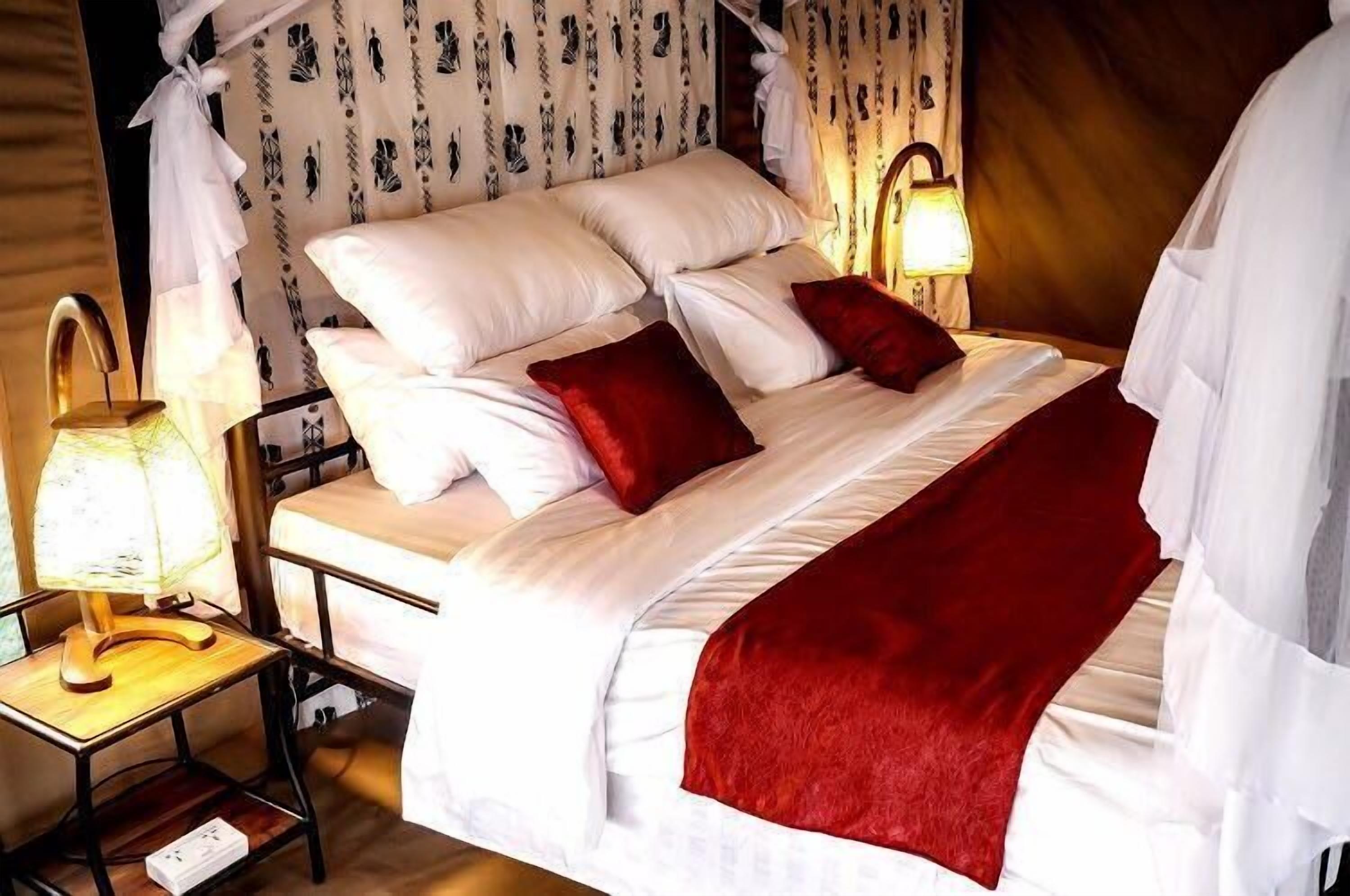 luxury tent | premium bedding, down duvets, individually decorated