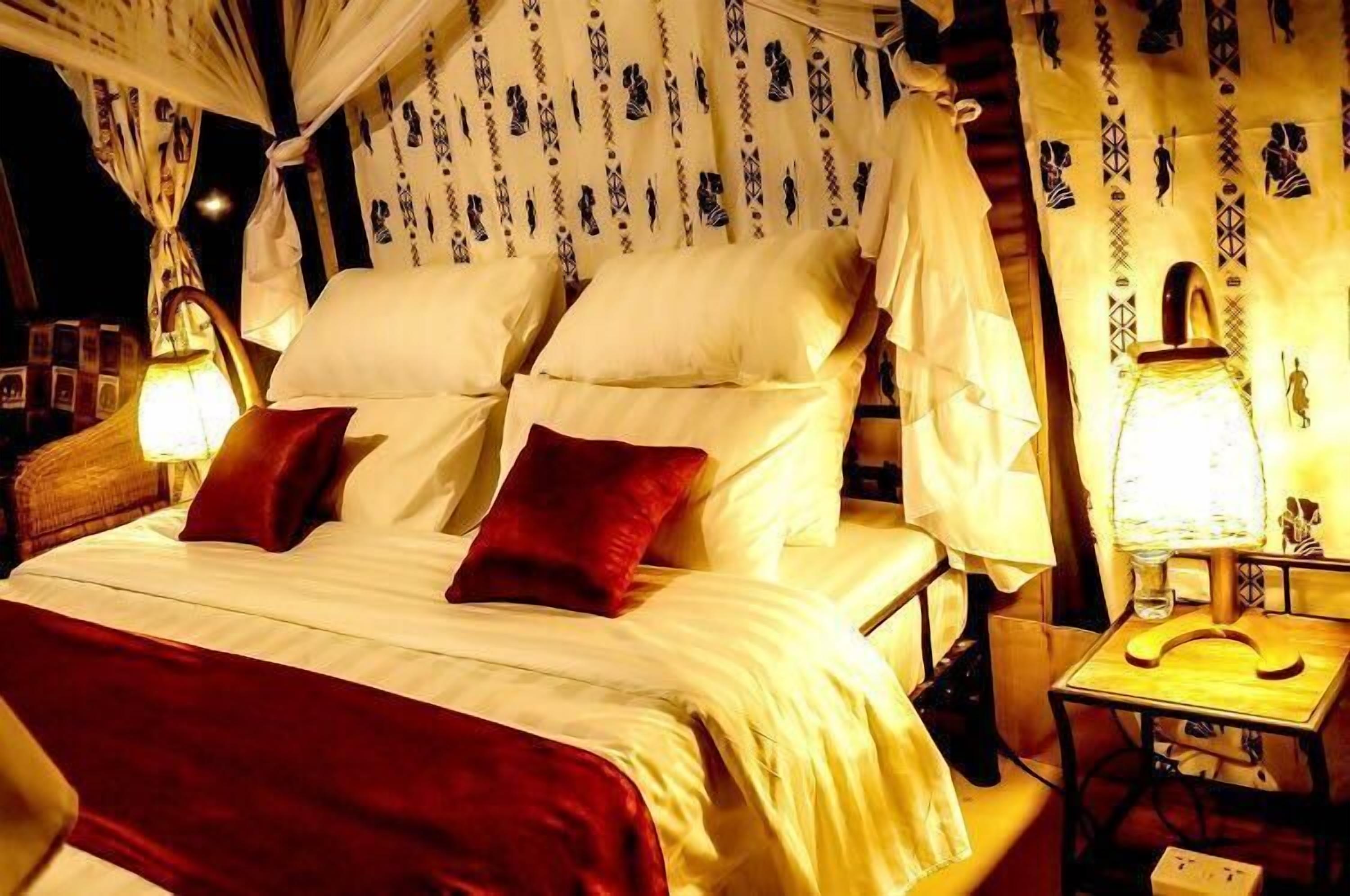 luxury tent | premium bedding, down duvets, individually decorated