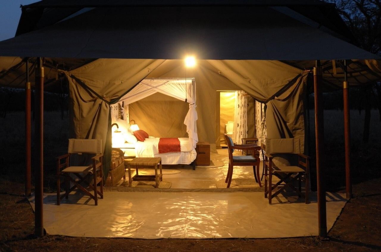 luxury tent | premium bedding, down duvets, individually decorated