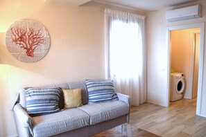 Appartement Deluxe, 3 chambres (17) | Coin séjour | TV connectée