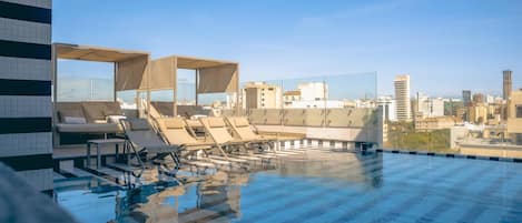 Outdoor pool, sun loungers