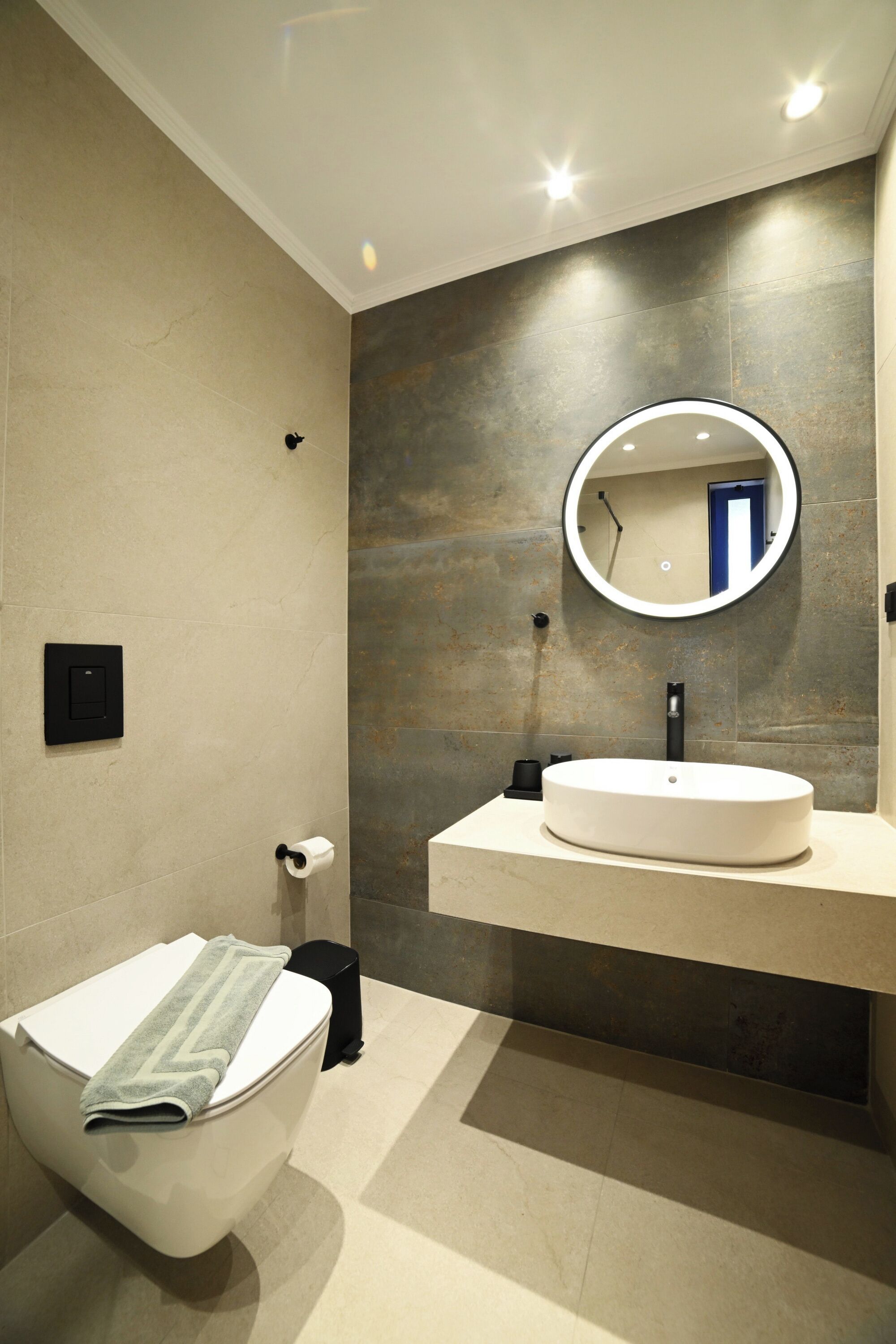 deluxe double / twin room with side sea view | bathroom | shower, rainfall showerhead, hair dryer, towels