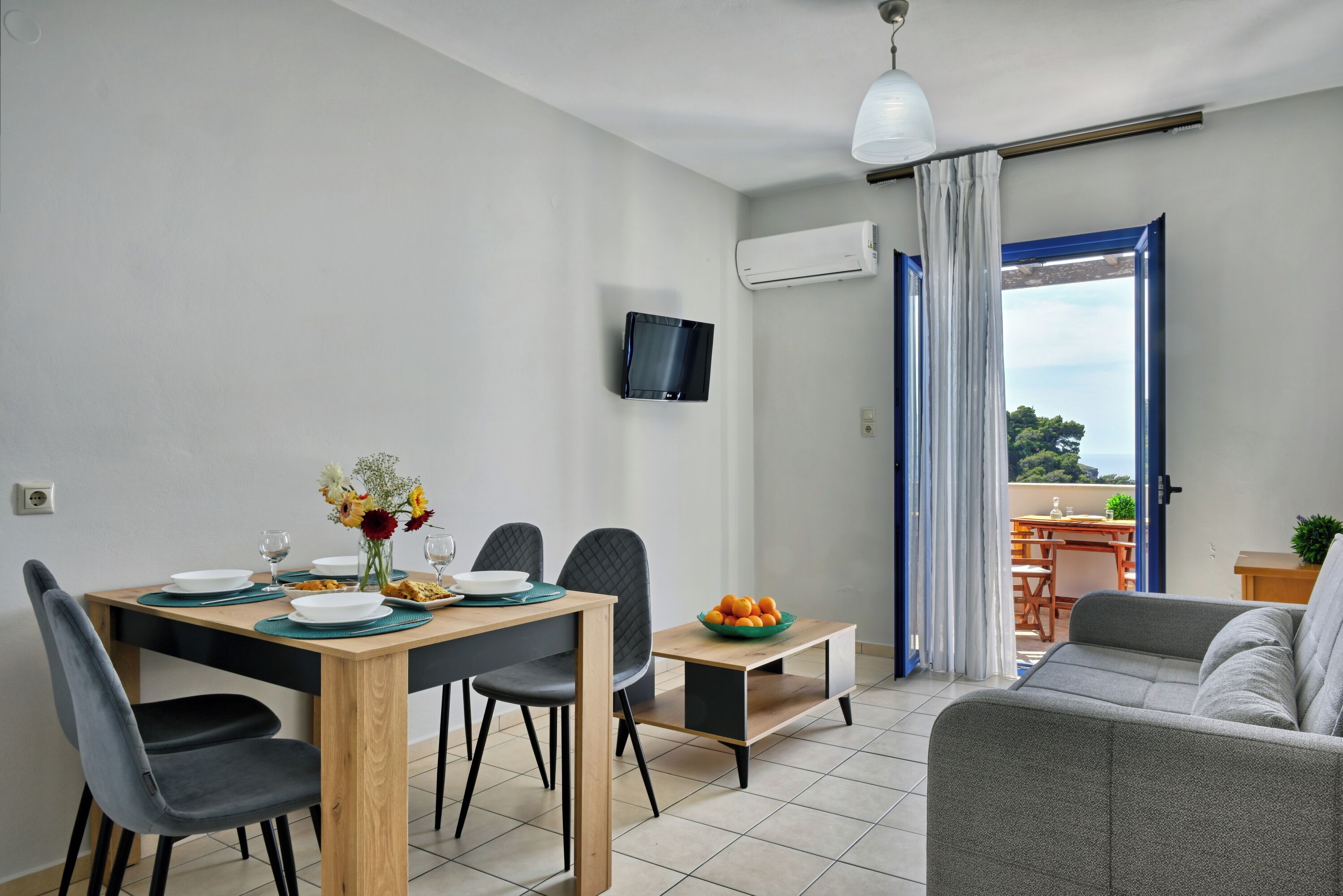 apartment with sea view | living area | lcd tv