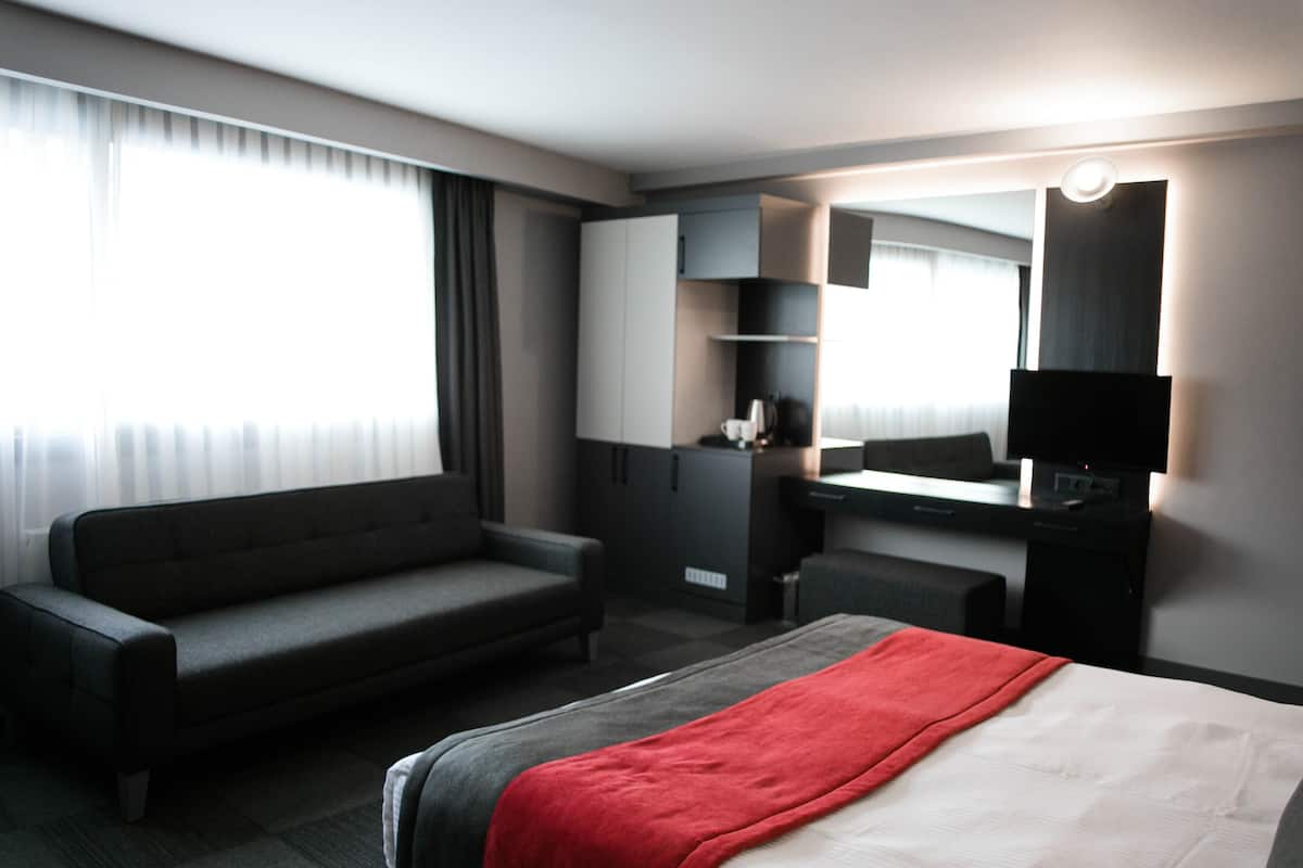 Executive kamer | Lakens van Egyptisch katoen, luxe beddengoed, een minibar