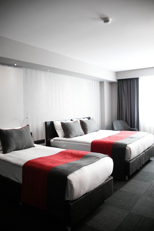 Egyptian cotton sheets, premium bedding, minibar, in-room safe