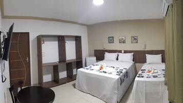 Quadruple Room (Vista Jardim) | Blackout drapes, iron/ironing board, free WiFi, bed sheets