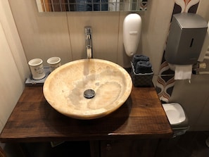 Shower, hair dryer, towels, shampoo