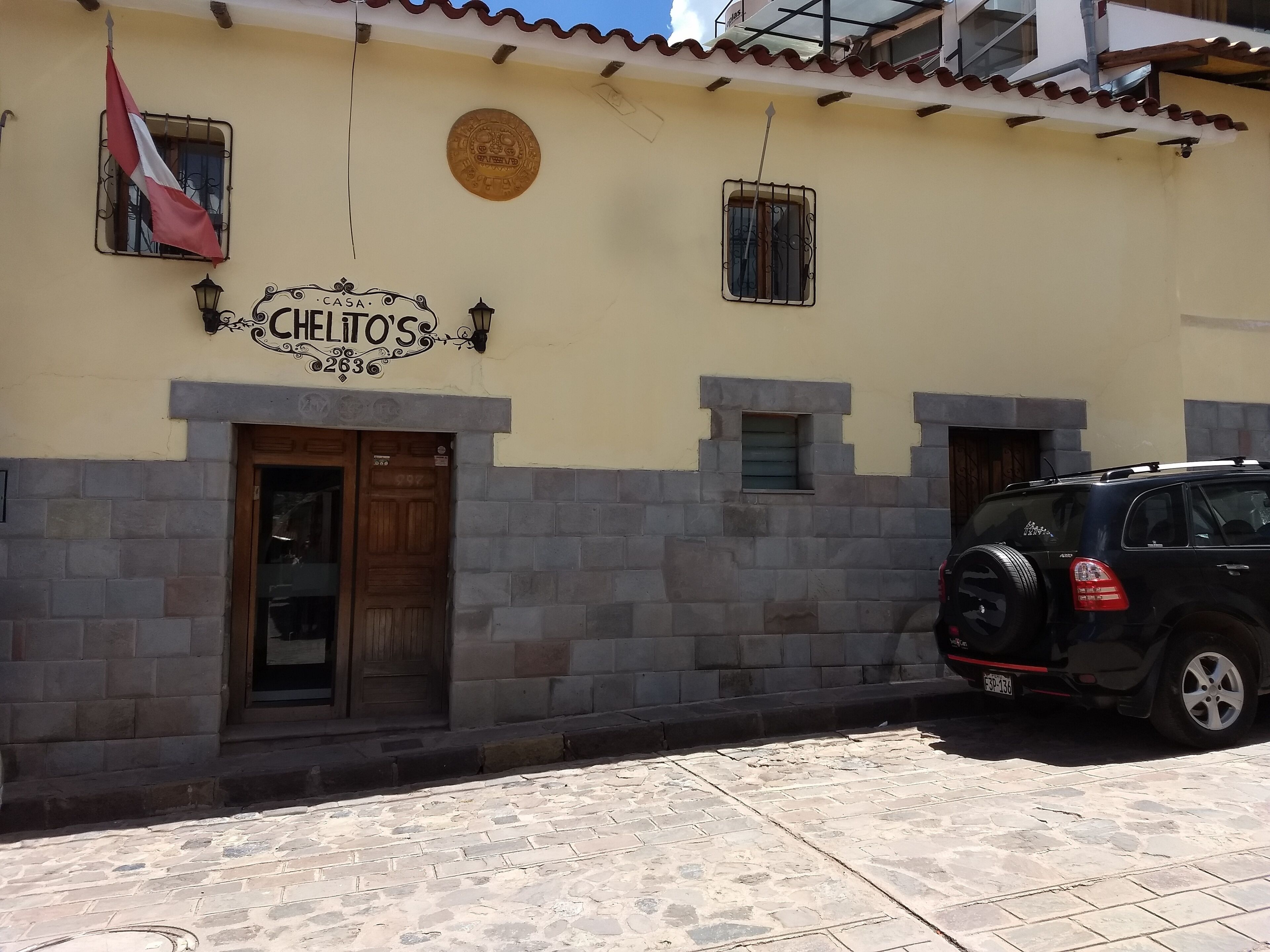 A building with a sign reading "CHELITOS 9263".