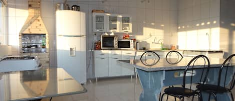 Microwave, stovetop, coffee/tea maker, cookware/dishes/utensils