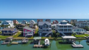 A coastal residential area with houses and docks. - Channel Marker (Murrells Inlet)