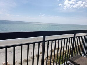 A balcony with a view of a beach and ocean. - Sun N Sand 811 (Myrtle Beach)