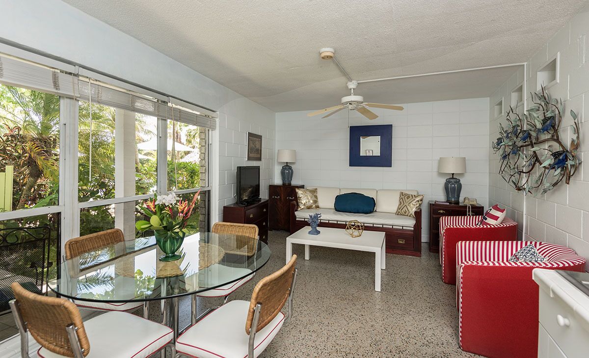 standard suite, 1 queen bed with sofa bed, pool view | in-room dining