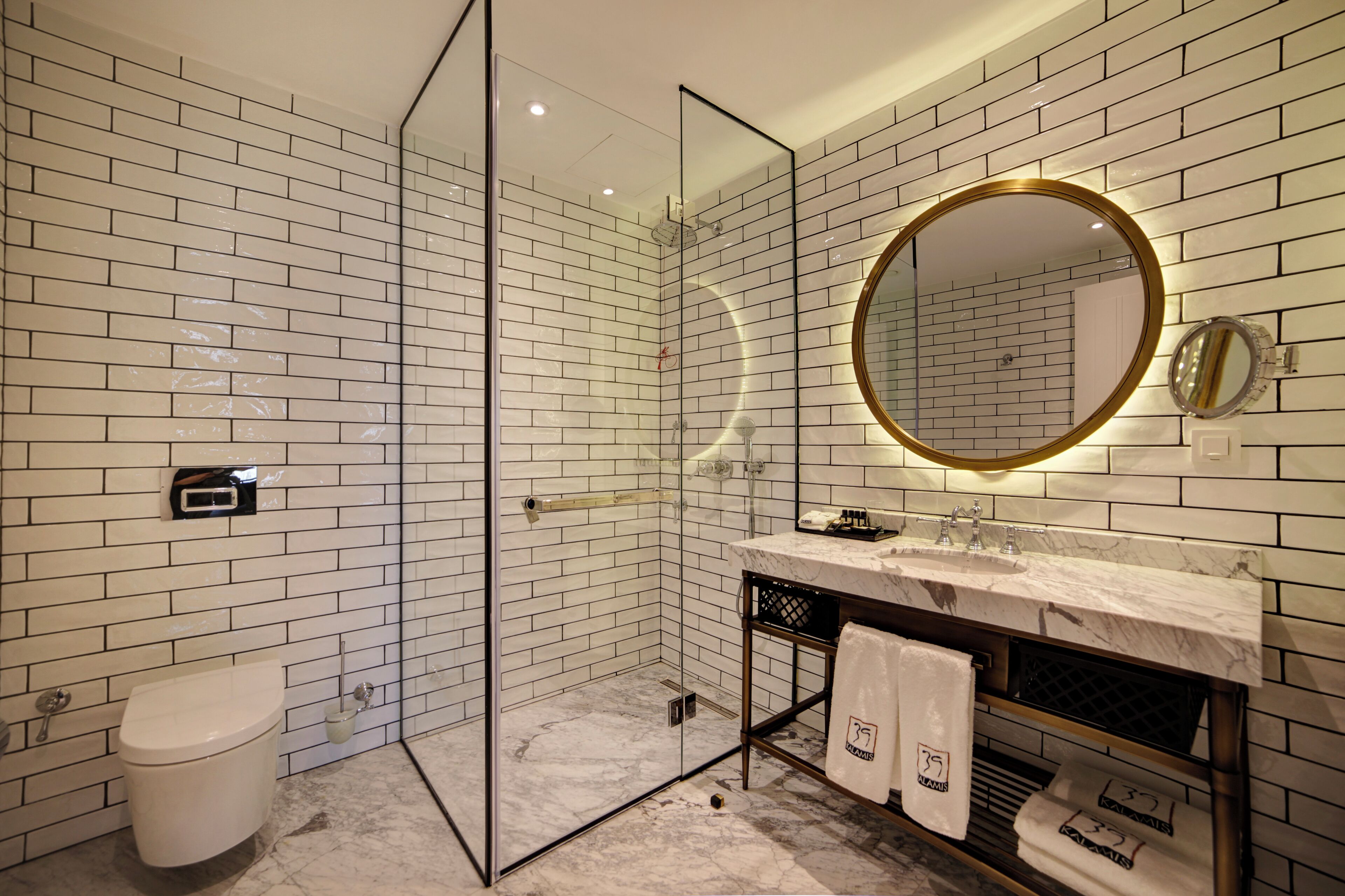 marina deluxe room | bathroom | shower, rainfall showerhead, free toiletries, hair dryer