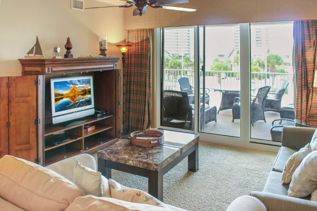 Condo, 2 Bedrooms | Living room | 30-inch TV with digital channels
