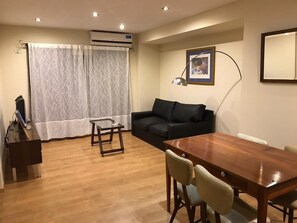 Family Apartment | Living area | TV - Departamento 1 Hab. con Piscina en Salta (Salta)