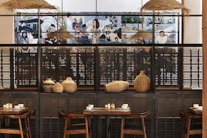 Breakfast, lunch, dinner served; local and international cuisine