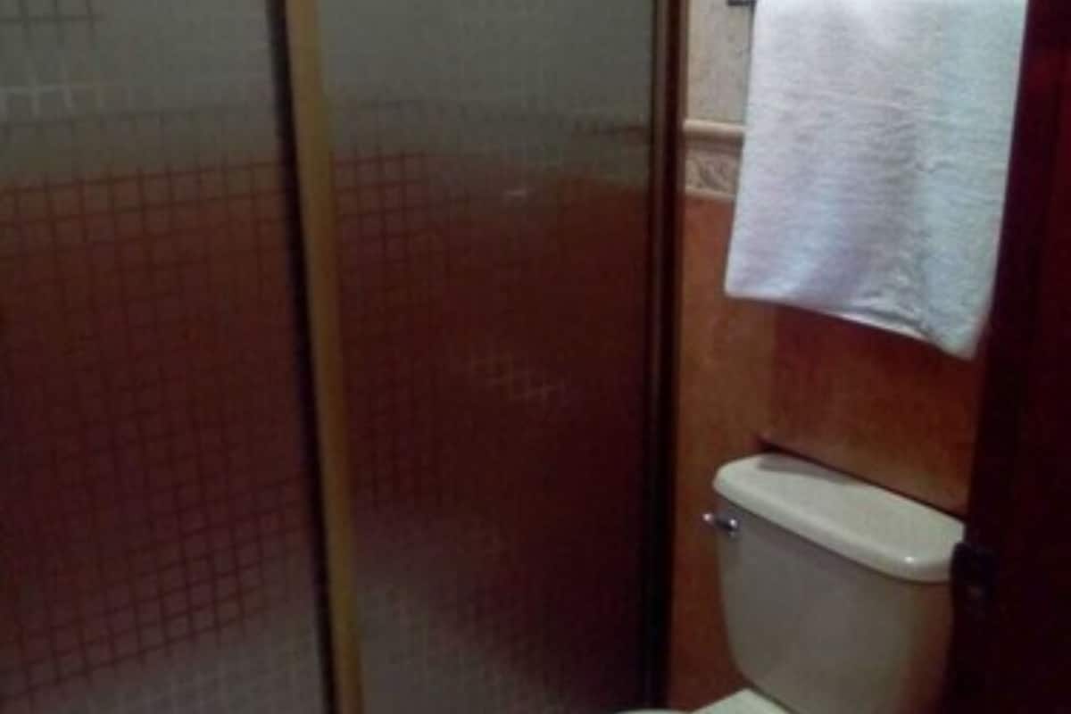 shower, rainfall showerhead, hair dryer, towels