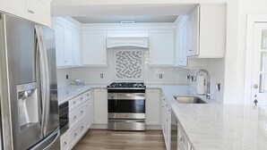 House, Multiple Beds, Patio | Private kitchen | Coffee/tea maker, fridge, microwave, stovetop