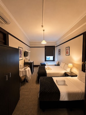 Quadruple Room (1 Queen and 2 Single) with Shared Bathroom