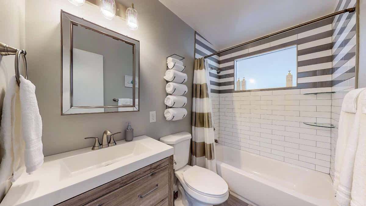 Bathtub, hair dryer, towels