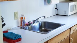 Cabin, Multiple Beds (122 - Mutiny Bay Waterfront Cabin) | Private kitchen | Microwave - 122 - Mutiny Bay Waterfront Cabin (Freeland)