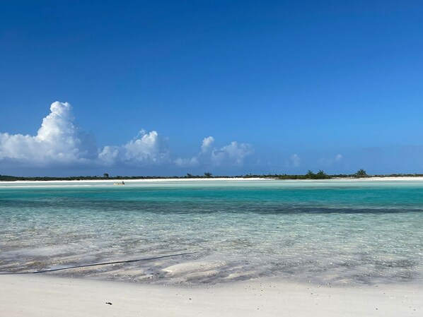 On the beach, sun-loungers, beach towels