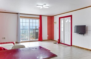 Rose of Sharon Room | Living area | Flat-screen TV