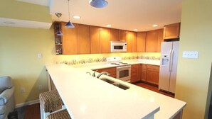 Condo, 2 Bedrooms | Private kitchen - Henlopen Unit 608 by Long & Foster (Rehoboth Beach)