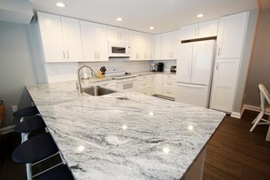 Condo, 2 Bedrooms | Private kitchen - Henlopen Unit 716 by Long & Foster (Rehoboth Beach)