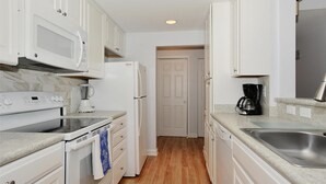 Condo, 2 Bedrooms | Private kitchen - Henlopen Unit 513 by Long & Foster (Rehoboth Beach)