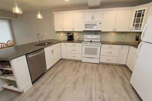 Condo, 2 Bedrooms | Private kitchen - Henlopen Unit 417 by Long & Foster (Rehoboth Beach)