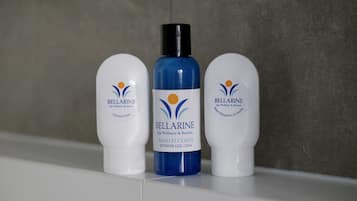 Three bottles of Bellarine spa wellness and retreat products on a shelf.