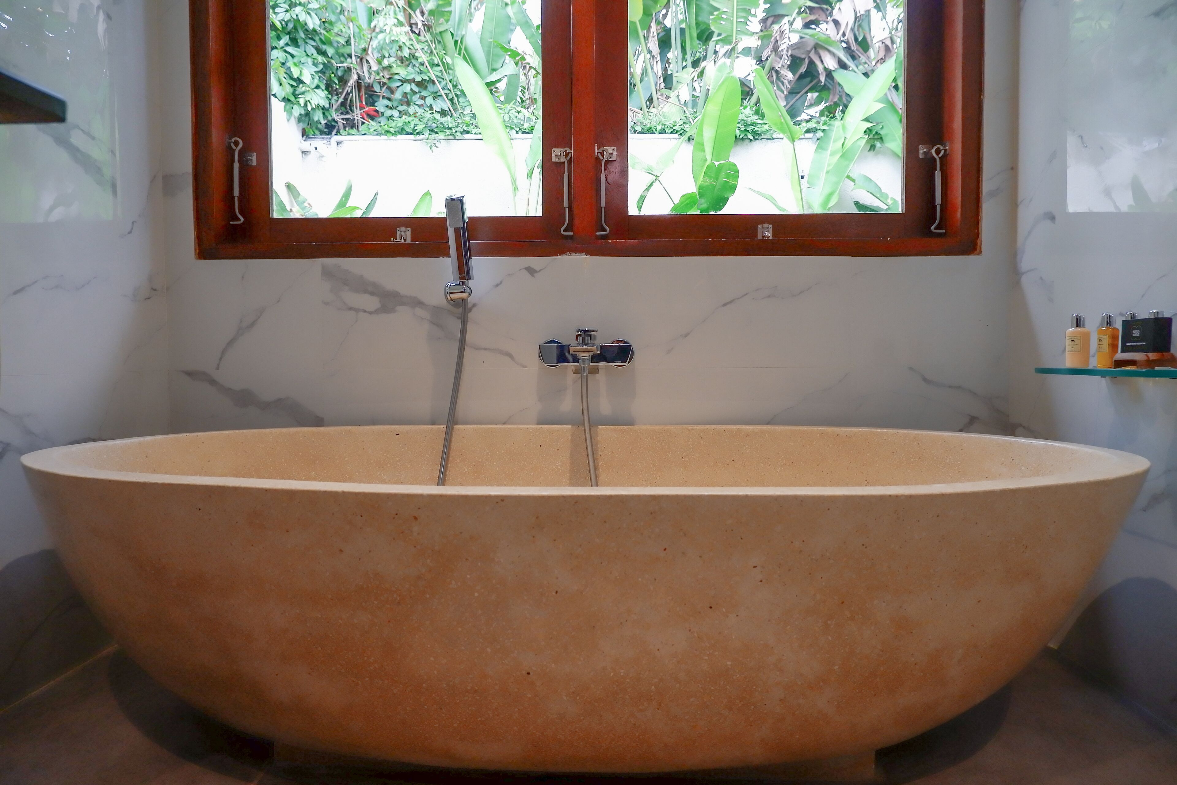 Combined shower/tub, hair dryer, towels, soap