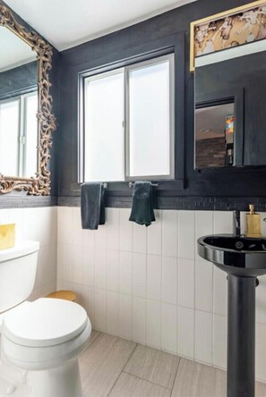 Shower, hair dryer, towels, toilet paper