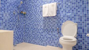 Combined shower/tub, hair dryer, towels, soap