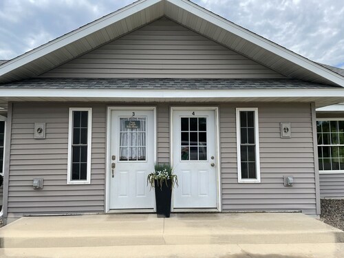 Cozy Bike House next to C-I Loop bike, snowmobile trail. In the Center of It all