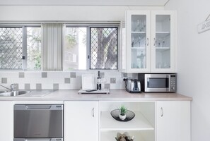 Fridge, microwave, oven, stovetop - Lovely 2BR Riverfront Condo New Farm (New Farm)