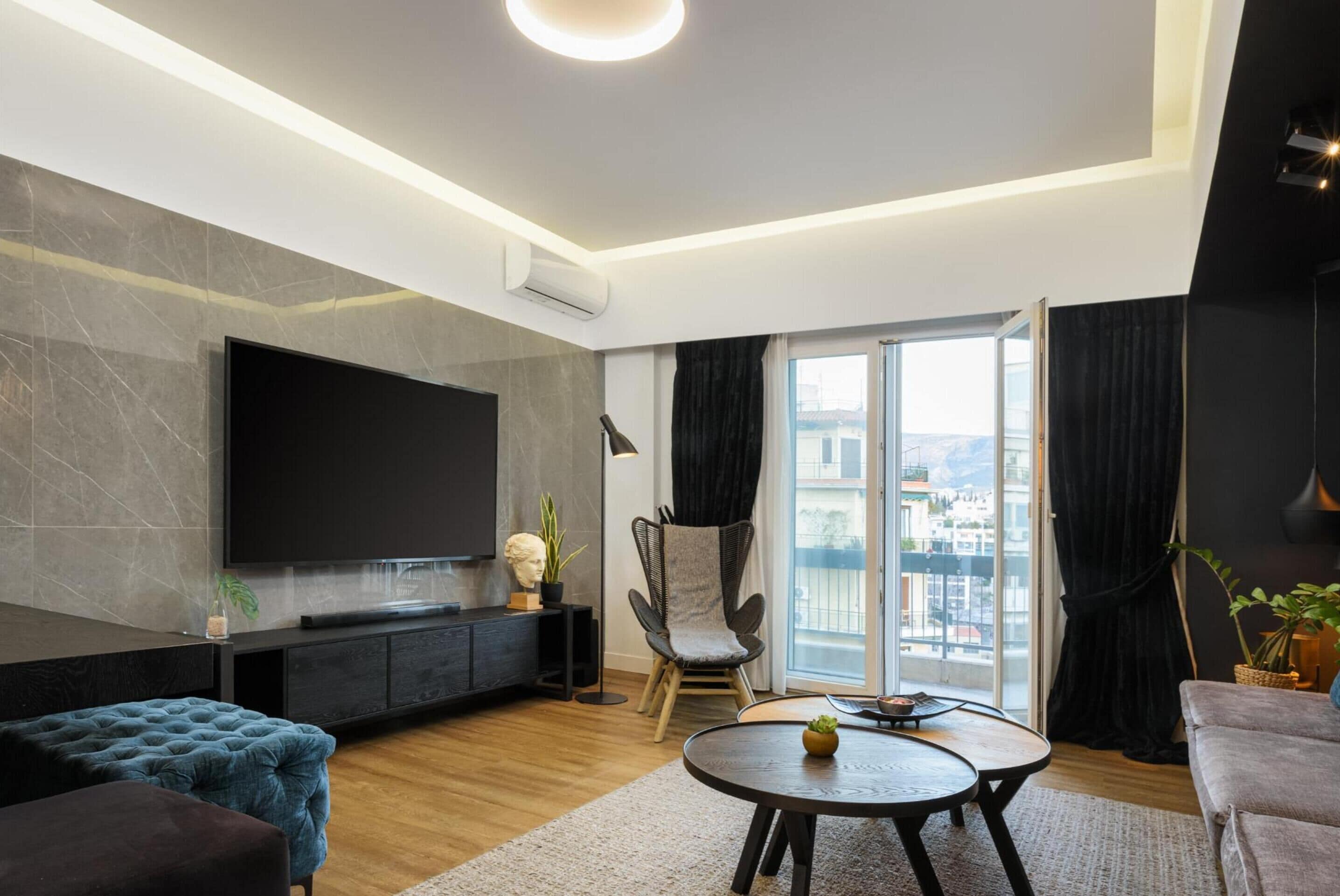 Departamento exclusivo, 4 habitaciones | Área de sala de estar | Smart TV, Netflix, reproductor de DVD y libros 