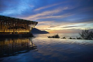 A waterfront hotel with a modern design, featuring a pool and a view of the sea. - Angsana Teluk Bahang, Penang (George Town)
