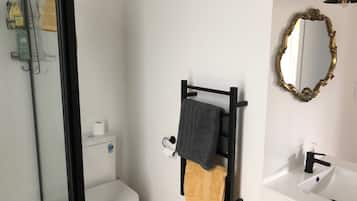 Shower, hair dryer, towels, soap